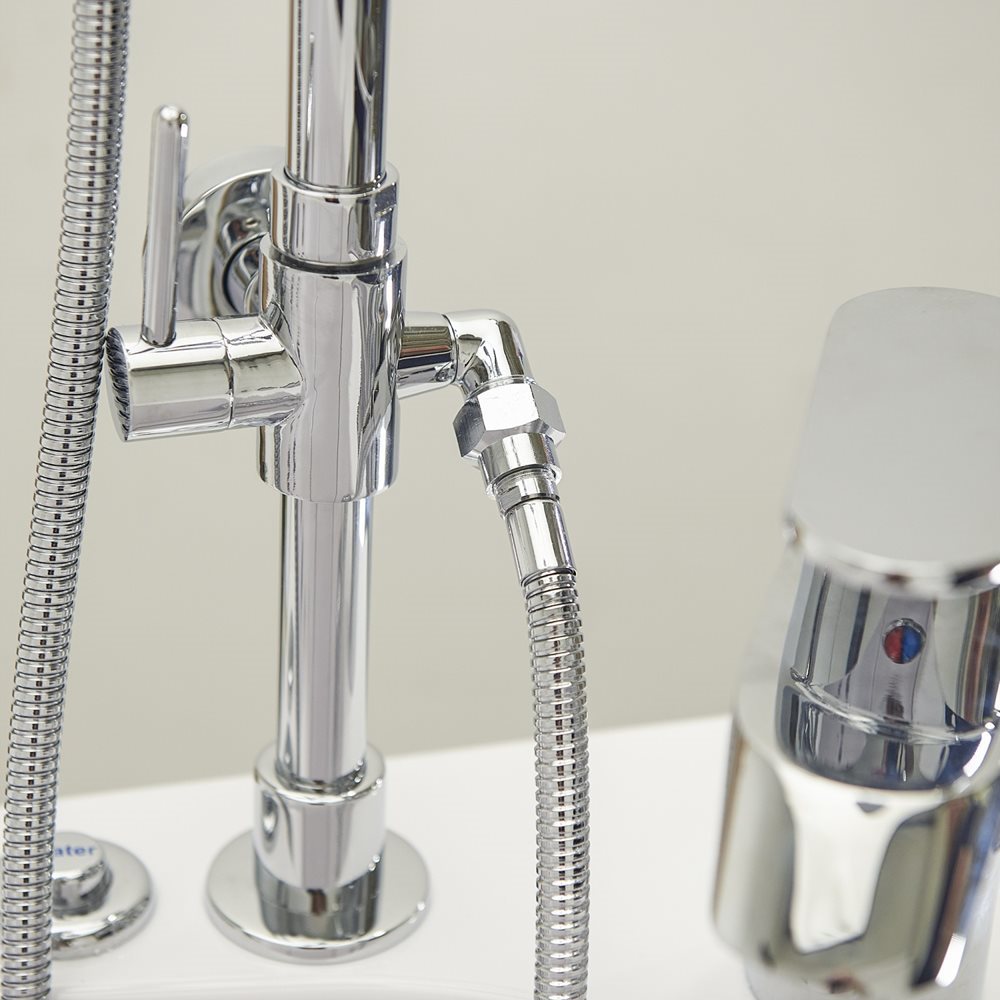 10″ Kit de tête de douche et colonne de douche pour robinets de baignoire encastrés dans le sol - %3E - Close-up of chrome faucet hardware with flexible hose and thermostatic valve on a walk-in tub deck