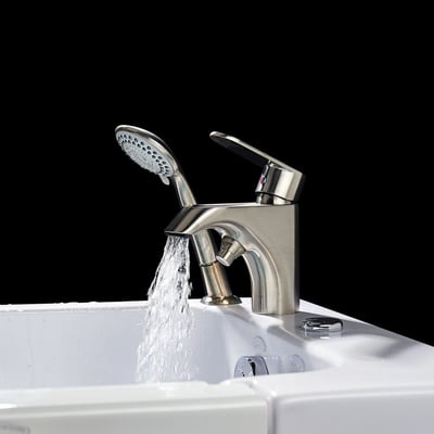 Close-up of Ella brushed nickel single lever fast fill faucet with handheld showerhead running water into a walk-in tub