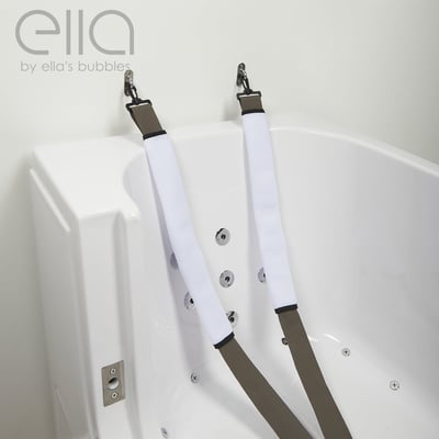 Close-up of padded safety seat belt straps with metal clips mounted inside an Ella walk-in tub for added security