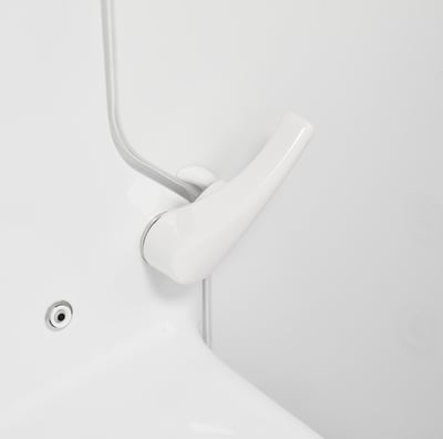 Close-up of white lever door handle and grab bar on the Ella Standard 3052 walk-in tub with chrome accent details