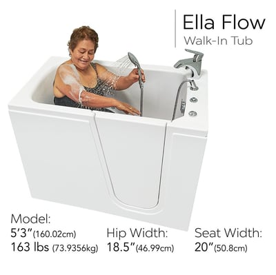 Senior woman smiling while using a handheld showerhead inside the Ella Flow walk-in tub with chrome faucet controls