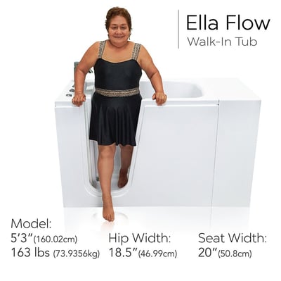 Woman stepping out of the Ella Flow walk-in tub showing low-step door entry and spacious 20-inch seat width