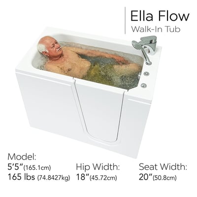 Senior man smiling and relaxing in a bubbling hydro massage bath inside the Ella Flow walk-in tub with chrome faucet
