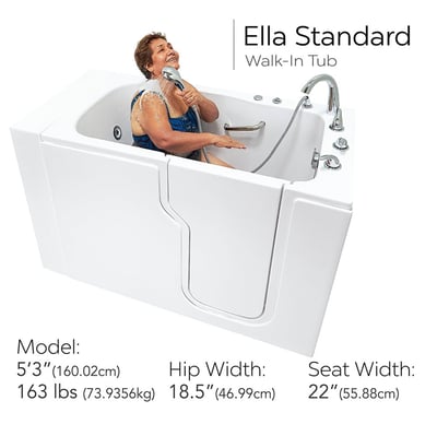 Senior woman laughing while using handheld shower in the Ella Standard walk-in tub with chrome faucet and jets visible