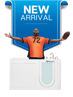 Man in football jersey holding a football standing behind a new arrival Ella Big4One walk-in tub with side door entry