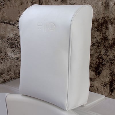 Close-up of Ella's white padded removable headrest and neck support cushion for walk-in tubs displayed upright