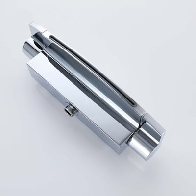 Close-up of a polished chrome waterfall tub spout with side water outlet fitting for an accessible walk-in tub