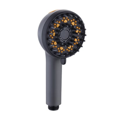 Close-up of a matte black handheld showerhead with multi-function spray nozzles and soft rubber massage jets