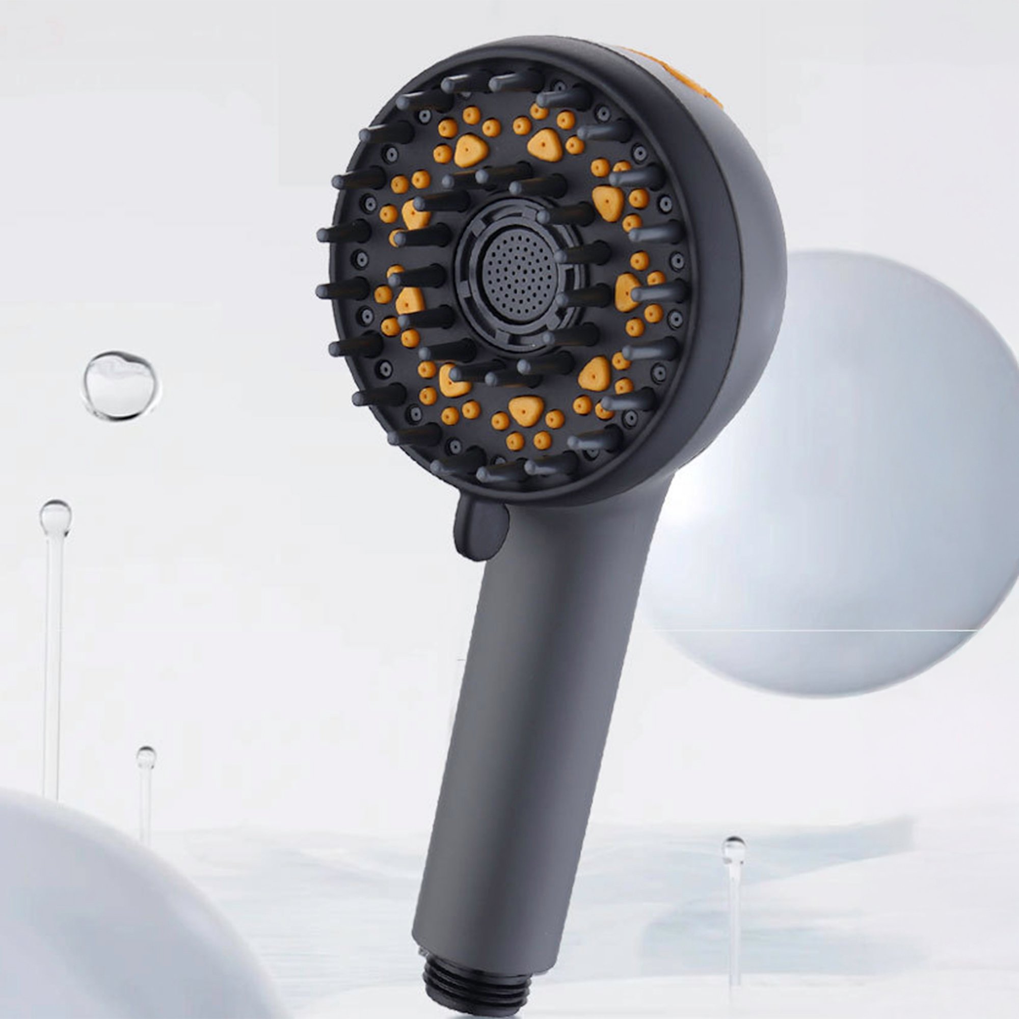 Microbubble Therapy Dog & Pet Spa Bathtub and Jetted Shower - %3E - Close-up of a matte black handheld shower head with yellow massage nubs and multi-spray nozzle face
