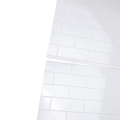 Close-up of white subway tile pattern shower wall panels with tongue and groove tongue-and-groove seam detail