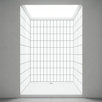 Empty walk-in shower stall interior with white grid tile walls, flat shower base, and center drain