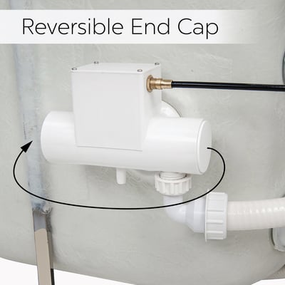 Close-up of a walk-in tub reversible end cap drain assembly with white PVC pipes and rotation arrow indicator