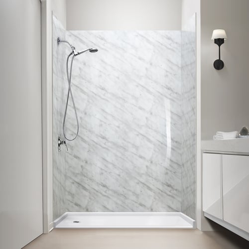 Ella Carrara marble acrylic shower wall surround with chrome handheld showerhead and white low-threshold shower base