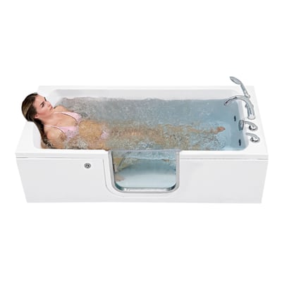 Woman in pink bikini reclining in an Ella lay-down walk-in tub with active hydro massage jets and chrome faucet fixtures