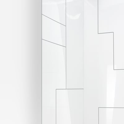 Close-up of UrbanMaze acrylic shower wall panels in white gloss with geometric tile pattern and gray grout lines
