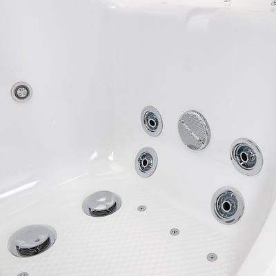 Close-up of chrome hydro massage jets, air jets, LED light, and speaker inside the Ella Tub4Two walk-in tub interior
