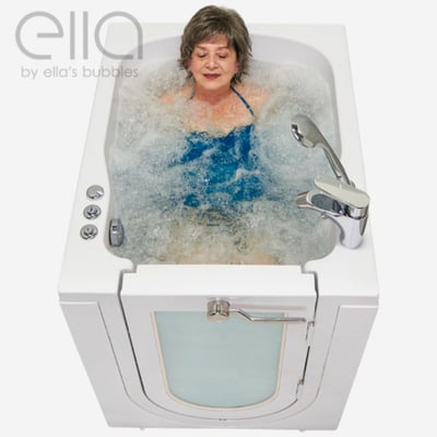 Senior woman relaxing with eyes closed in an Ella front-entry walk-in tub with air bubble jets and outward swing door