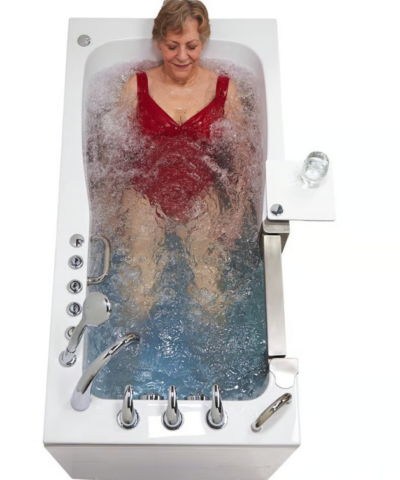 Bather relaxing in an Ella Ultimate walk in tub as combined air and hydro massage jets churn the water