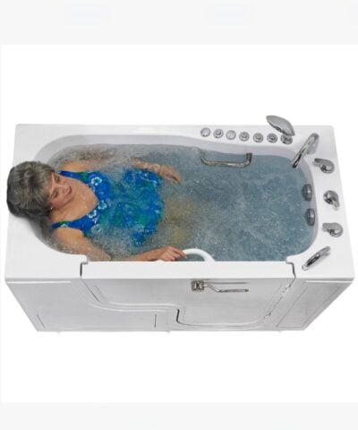 Transfer60 walk in tub seen from above with a woman relaxing in bubbling hydrotherapy water